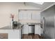 Kitchen featuring granite countertops, white cabinets, and stainless steel appliances at 148 Silver Lake Pt Pt, Sanford, NC 27332