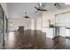 Open concept living room with kitchen, fireplace, and hardwood floors at 148 Silver Lake Pt Pt, Sanford, NC 27332