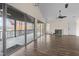 Bright living room with hardwood floors, fireplace, and deck access with water views at 148 Silver Lake Pt Pt, Sanford, NC 27332