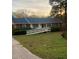 Ranch-style brick home with a ramp and spacious yard at 1605 Spring Dr, Garner, NC 27529