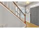 Hardwood floors and a staircase in a light entryway at 1706 Lisburn Ct, Garner, NC 27529