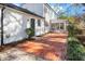 Brick patio adjacent to house with access from sunroom at 203 Hillside Dr, Smithfield, NC 27577