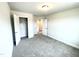 Light-filled bedroom with carpet flooring and ample closet space at 237 Hopewell Branch Ct, Smithfield, NC 27577