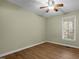 Spacious bedroom with large window and ceiling fan at 3064 Carolina Way, Sanford, NC 27332