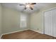 Bright bedroom with window, closet, and ceiling fan at 3064 Carolina Way, Sanford, NC 27332