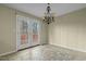 Dining room with tile floors and access to deck at 3064 Carolina Way, Sanford, NC 27332