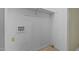 Small laundry room with built-in shelving at 3064 Carolina Way, Sanford, NC 27332