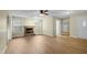 Living room with fireplace, hardwood floors and ceiling fan at 3064 Carolina Way, Sanford, NC 27332
