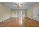 Hardwood floor living room with door and sliding glass door at 3064 Carolina Way, Sanford, NC 27332