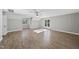 Large bedroom with hardwood floors, high ceiling and multiple windows at 3128 Gold Dust Ln, Willow Springs, NC 27592