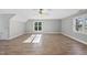 Spacious bedroom with hardwood floors, high ceiling and multiple windows at 3128 Gold Dust Ln, Willow Springs, NC 27592