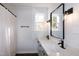 Double vanity bathroom with updated countertops and mirrors at 3317 E Jameson Rd, Raleigh, NC 27604