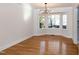 Spacious dining area with hardwood floors and bay window at 3317 E Jameson Rd, Raleigh, NC 27604