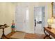 Bright entryway with hardwood floors and view to living room at 3339 Ridgecrest Ct, Raleigh, NC 27607