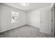 Simple bedroom with gray carpet and a window at 3708 Watson Ridge Ln # Leighton, Raleigh, NC 27616