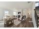 Spacious living room featuring hardwood floors and a fireplace at 3708 Watson Ridge Ln # Leighton, Raleigh, NC 27616