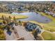 Golf course clubhouse and surrounding neighborhood shown from above at 400 Challenge Rd, Raleigh, NC 27603