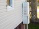 Exterior view of house showing a gas meter and vinyl siding at 477 Providence Rd, Roxboro, NC 27574