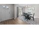 Bright dining room with four chairs and chandelier at 50 Timber Ct, Spring Hope, NC 27882