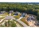 Aerial view of a cul-de-sac with several houses at 613 Darian Woods, Holly Springs, NC 27540