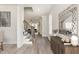 Bright entryway with hardwood floors and staircase at 613 Darian Woods, Holly Springs, NC 27540