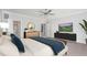 Relaxing main bedroom with a large bed, dresser, and ensuite bathroom access at 613 Darian Woods, Holly Springs, NC 27540
