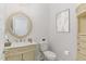 Elegant powder room with ornate vanity and decorative mirror at 613 Darian Woods, Holly Springs, NC 27540
