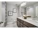 Clean bathroom with double vanity and marble flooring at 9516 Woodriver Dr, Zebulon, NC 27597