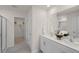 Double vanity bathroom with a walk-in shower and closet at 110 Tobacco Woods Dr, Youngsville, NC 27596