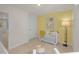 Bedroom with crib and yellow accent wall at 110 Tobacco Woods Dr, Youngsville, NC 27596
