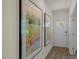 Bright entryway with large framed art and hardwood floors at 110 Tobacco Woods Dr, Youngsville, NC 27596