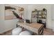 Bright home office features built-in shelving and hardwood floors at 110 Tobacco Woods Dr, Youngsville, NC 27596