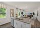 Open concept kitchen features granite countertops and stainless steel appliances at 110 Tobacco Woods Dr, Youngsville, NC 27596
