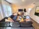 Spacious living room with a comfortable sectional sofa and large TV at 110 Tobacco Woods Dr, Youngsville, NC 27596