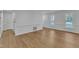 Spacious living area with hardwood floors and natural light at 4413 Lancashire Dr, Raleigh, NC 27613