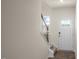 Entryway with stairs, wood floors, and a white door at 477 Belgian Red Way, Wake Forest, NC 27587