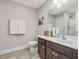 Bathroom with a toilet, vanity, and shower/tub combo at 505 Lucian Hilliard Rd, Goldston, NC 27252