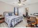 Bedroom with a queen-sized bed and home office space at 505 Lucian Hilliard Rd, Goldston, NC 27252