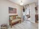 Entryway with wooden bench, American flag, and view of front porch at 505 Lucian Hilliard Rd, Goldston, NC 27252