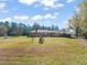 Large backyard with playset and open space at 5813 Cheek Rd, Durham, NC 27704