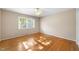 Bedroom with hardwood floors and ceiling fan at 5813 Cheek Rd, Durham, NC 27704