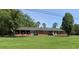 Ranch house with large yard and mature trees at 5813 Cheek Rd, Durham, NC 27704