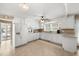 Kitchen with white cabinets and tile floors at 5813 Cheek Rd, Durham, NC 27704