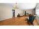 Living room with hardwood floors and chandelier at 5813 Cheek Rd, Durham, NC 27704