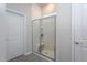 Clean bathroom with a large walk-in shower and neutral colors at 1018 Quiver Ln, Durham, NC 27703