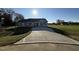New home with a large concrete driveway at 198 Pate Landing Dr, Selma, NC 27576