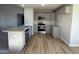 Modern kitchen with granite countertops and stainless steel appliances at 198 Pate Landing Dr, Selma, NC 27576
