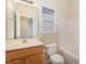 Simple bathroom with a tub, toilet, and vanity at 2124 Star Sapphire Dr, Raleigh, NC 27610
