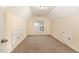 Bright bedroom with carpet flooring and ample closet space at 2124 Star Sapphire Dr, Raleigh, NC 27610