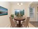 Charming breakfast nook with a round table and four chairs, near the kitchen at 2124 Star Sapphire Dr, Raleigh, NC 27610